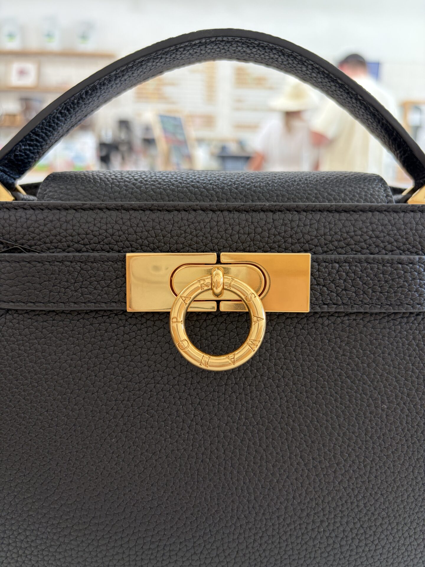 Up close of Parisa Wang gold hardware