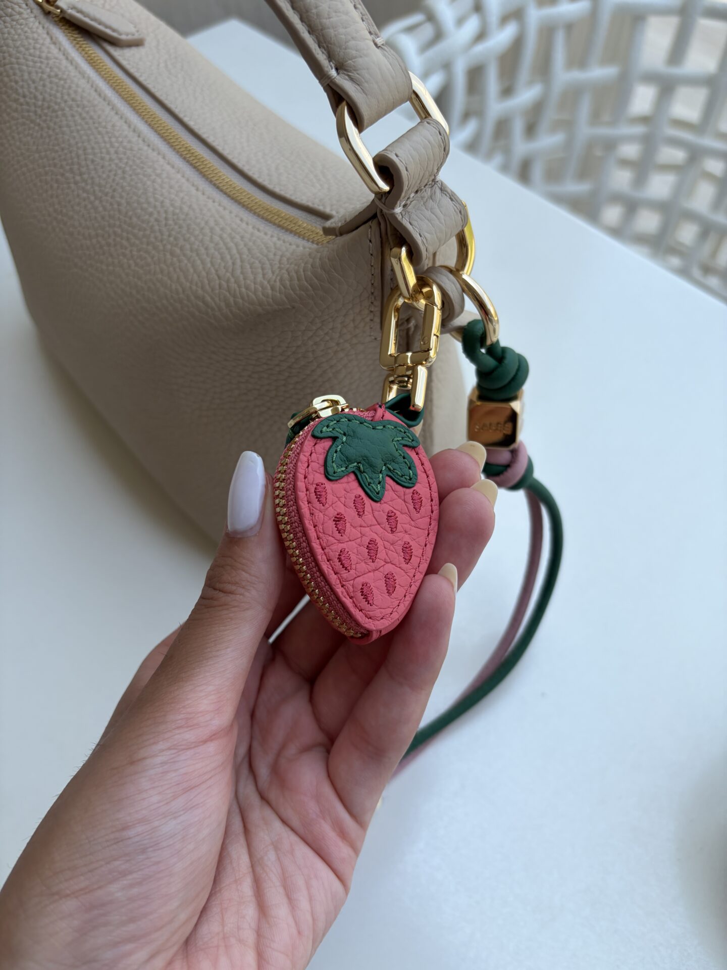 maison de sabre small soft hobo bag with charms
